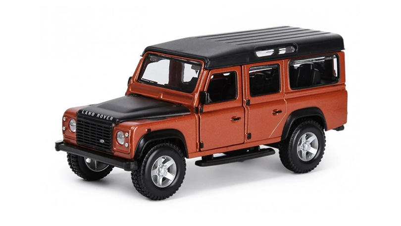 Land Rover Defender 110 1995 oranžová 1:32 - Bburago