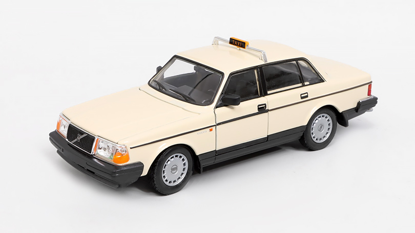 Volvo 240 GL 1986 Taxi Německo 1:24 - Welly